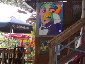 Sachmo banner at Cafe Aroma with Herb Jeffries banner in background