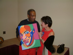 Bill Cosby & artist Marcia Gawecki with portrait. Photo courtesy Pechanga Casino